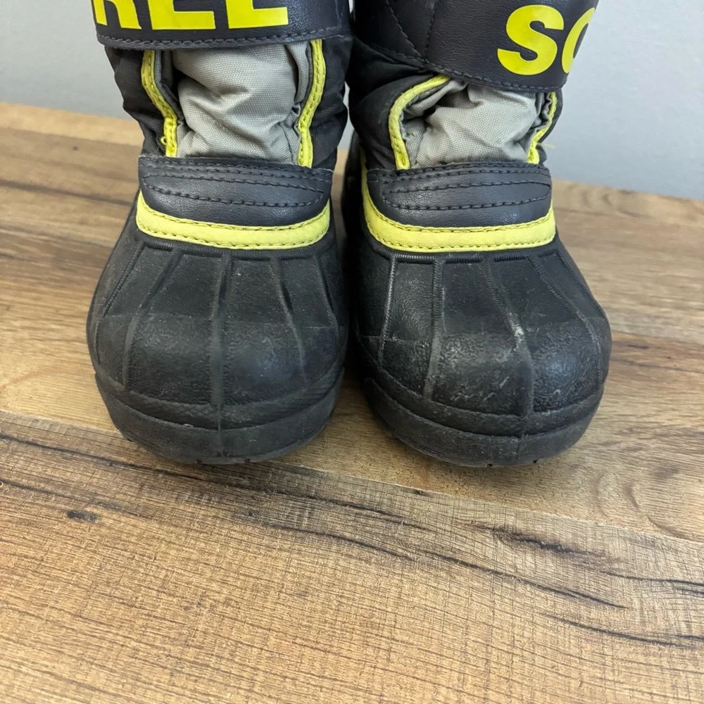 Sorel Kids Black and Yellow Snow Boots
